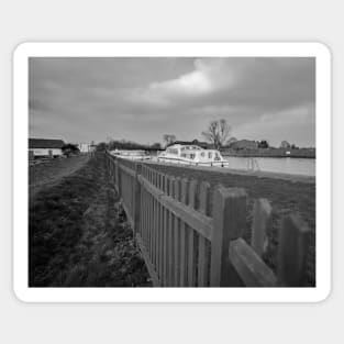 A view across the River Yare in the Norfolk village of Acle Sticker